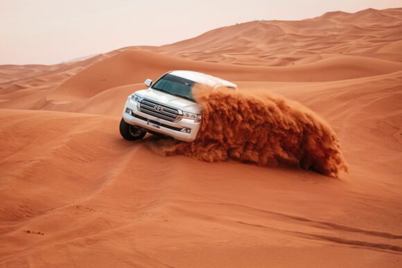 A Toyota Land Cruiser shows its capabilities on off-road terrain