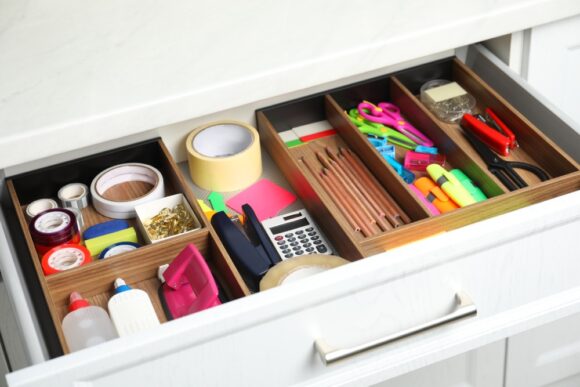 Desk drawer dividers for hidden organisation of school and office stationery supplies 
