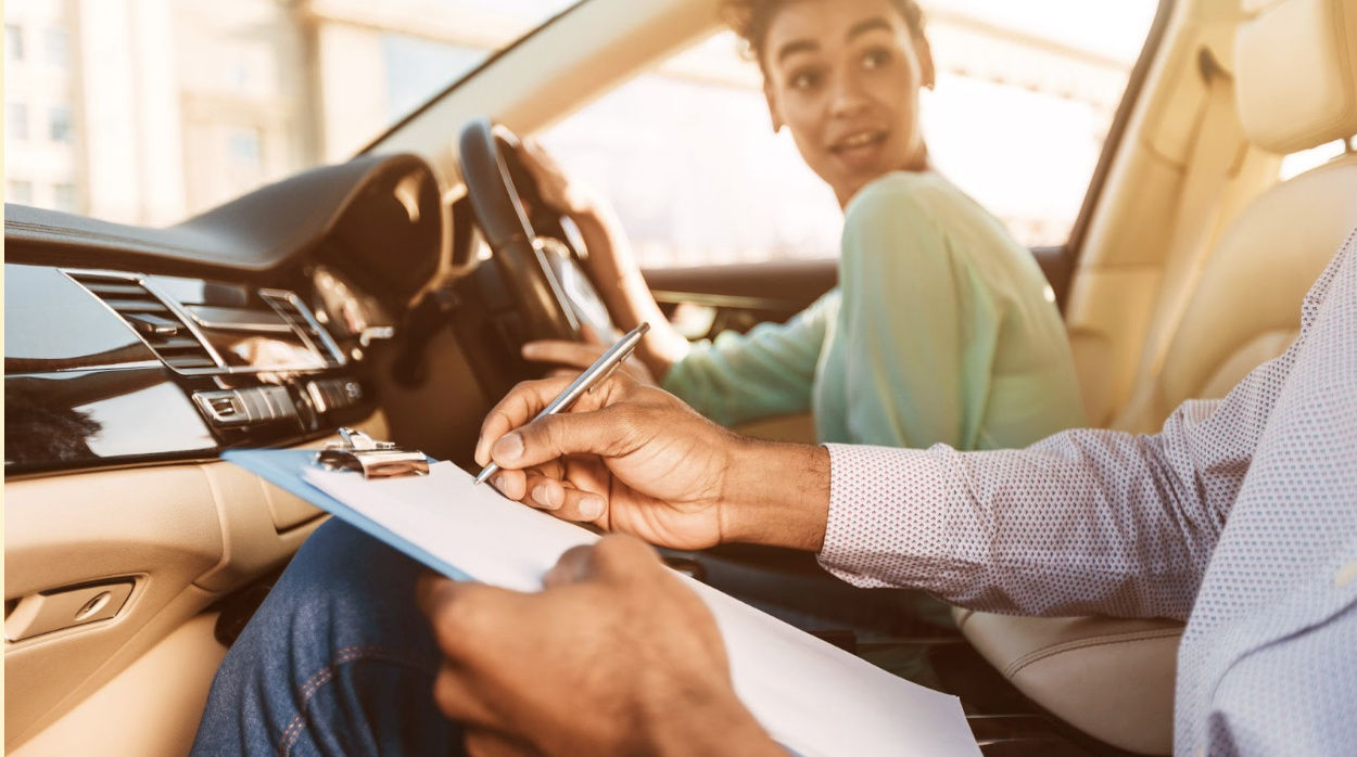A young lady gets ready for a driving lesson for a manual car in Cape Town